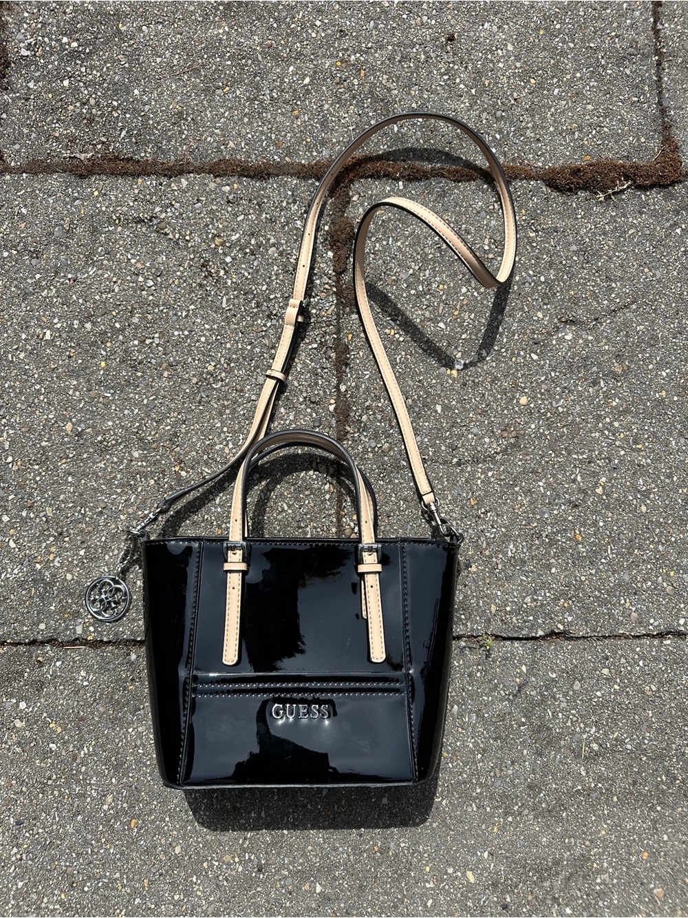 GUESS Delaney Black Patent Mini Tote Crossbody Bag Tan Strap - Picture 2 of 6